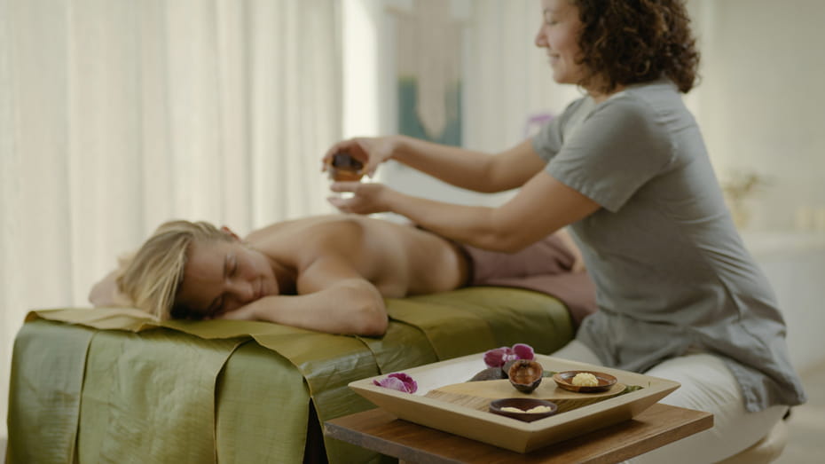 Local spa practitioner performing a wellness treatment